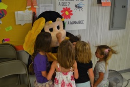 Big Bee likes his nose being squeezed