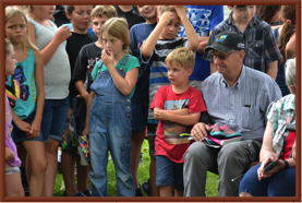 A real farmer 
with the kids